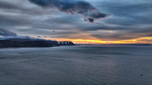 Where Granite Peaks Meet the Dying Light (Conwy Bay)