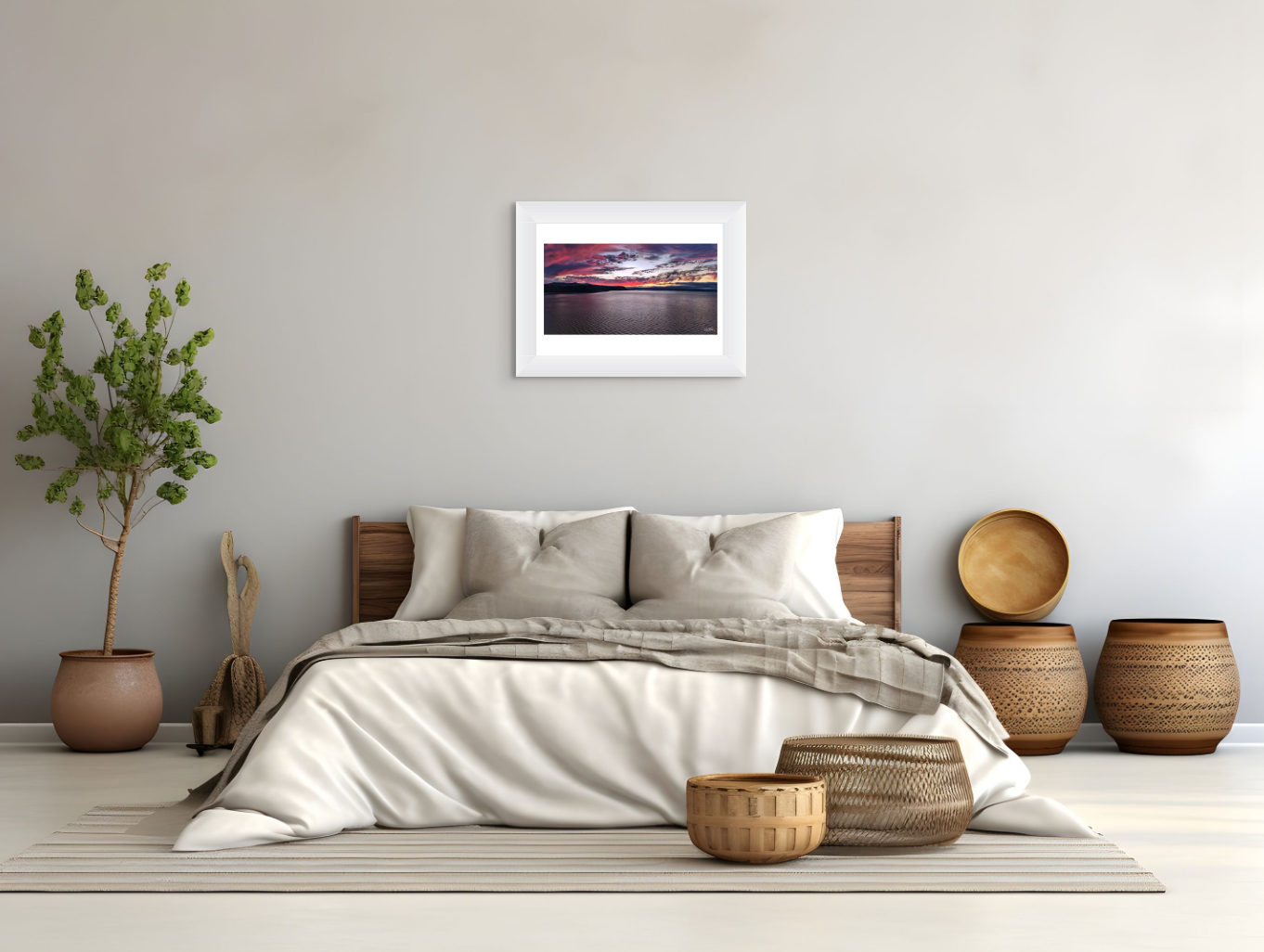 Bedroom with a bed, decorative baskets, and a framed picture on the wall.