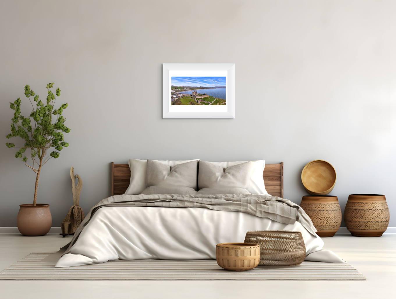 Bedroom with a bed, decorative baskets, and a framed picture on the wall.