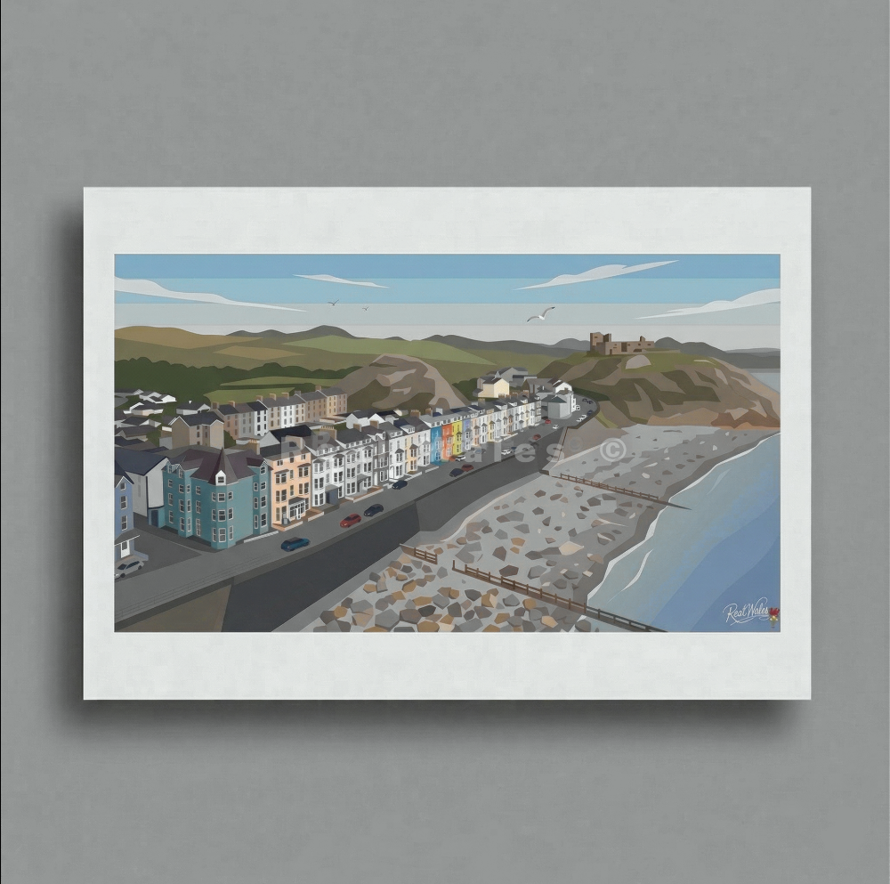 The low, multi-colored arc of Criccieth’s historic terraced seafront anchors the town against the tidal pull of Cardigan Bay, forging a vibrant path along the wind-sculpted coast. Long celebrated for its ancient, clifftop castle and the quiet majesty of its coastal edge, this historic seaside town awakens with a sense of cheerful, sea-bound permanence. 