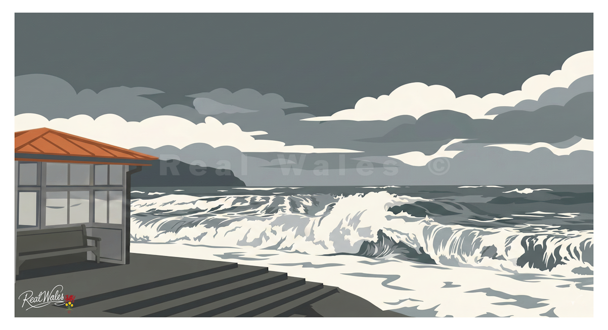 When a heavy weather system rolls into Llandudno Bay, the usually placid North Shore transforms into a theatre of maritime fury. The sweeping Victorian crescent, normally defined by gentle wavelets and leisurely strolls, becomes a frontline against the churning, restless Irish Sea. Driven by howling coastal winds, the water builds into dark, heavy swells of slate-grey and deep jade that march relentlessly toward the promenade.