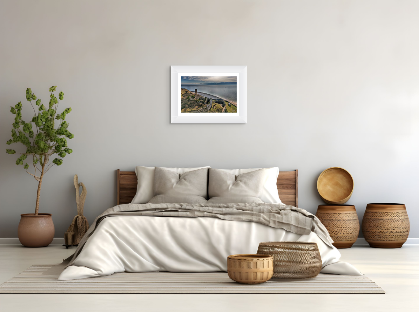 Bedroom with a bed, decorative baskets, and a framed picture on the wall.
