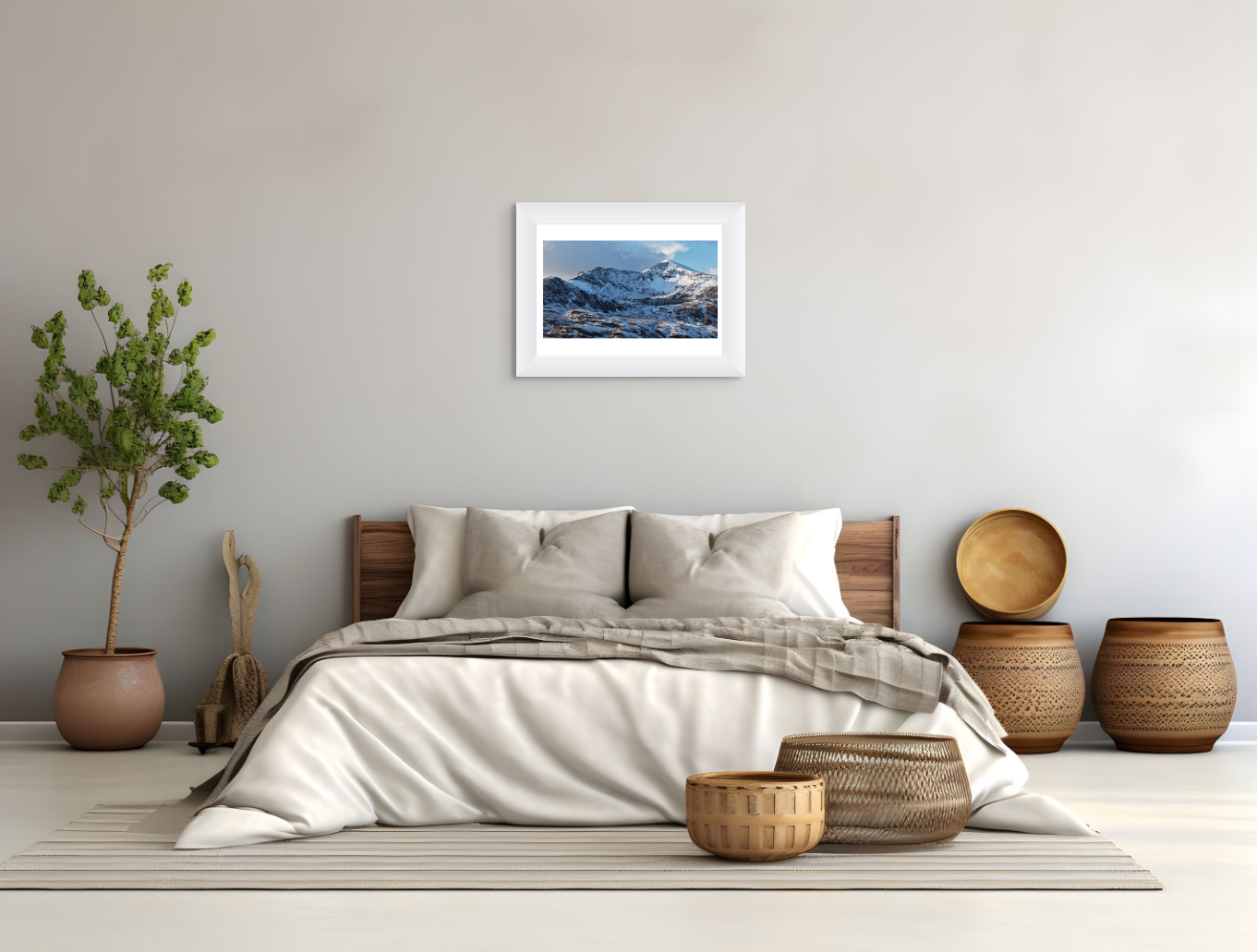 Bedroom with a bed, decorative baskets, and a framed picture on the wall.