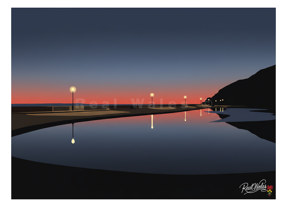 As the fiery colours of the sunset finally burn out and slip beneath the horizon, Llandudno's West Shore enters its most peaceful hour. The vibrant oranges and pinks give way to a cooling canopy of bruised purples, soft silvers, and deep, velvety blues.