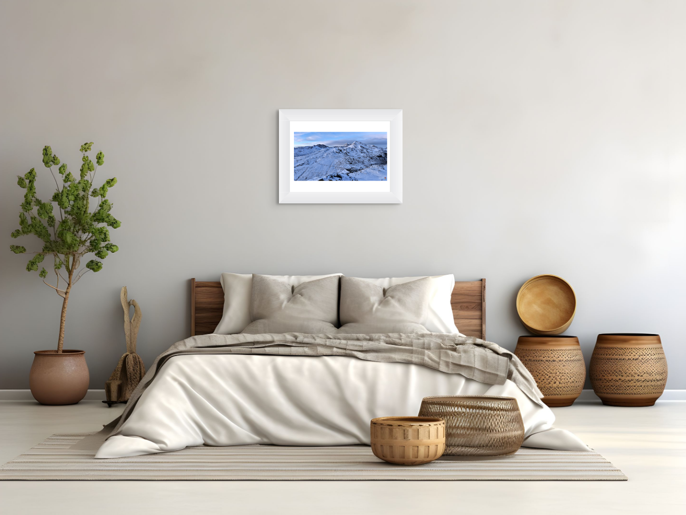 Bedroom with a bed, decorative baskets, and a framed picture on the wall.